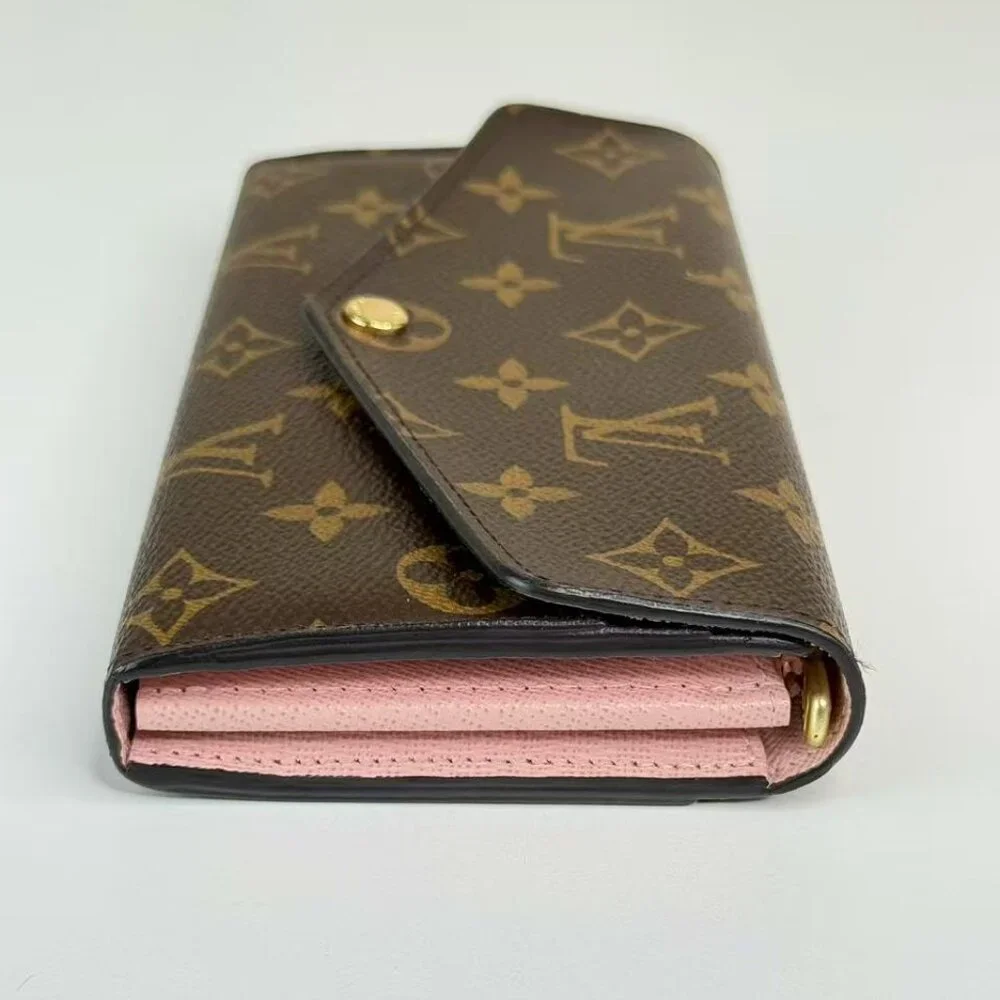 Louis Vuitton Monogram Canvas Wallet with Classic LV Logo Design
